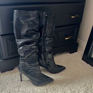 Snakeskin black leather boots